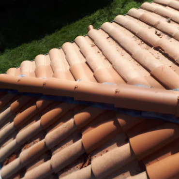 Nettoyage et démoussage de toiture 33